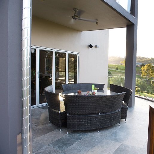 Large format natural stone tiles on balcony
